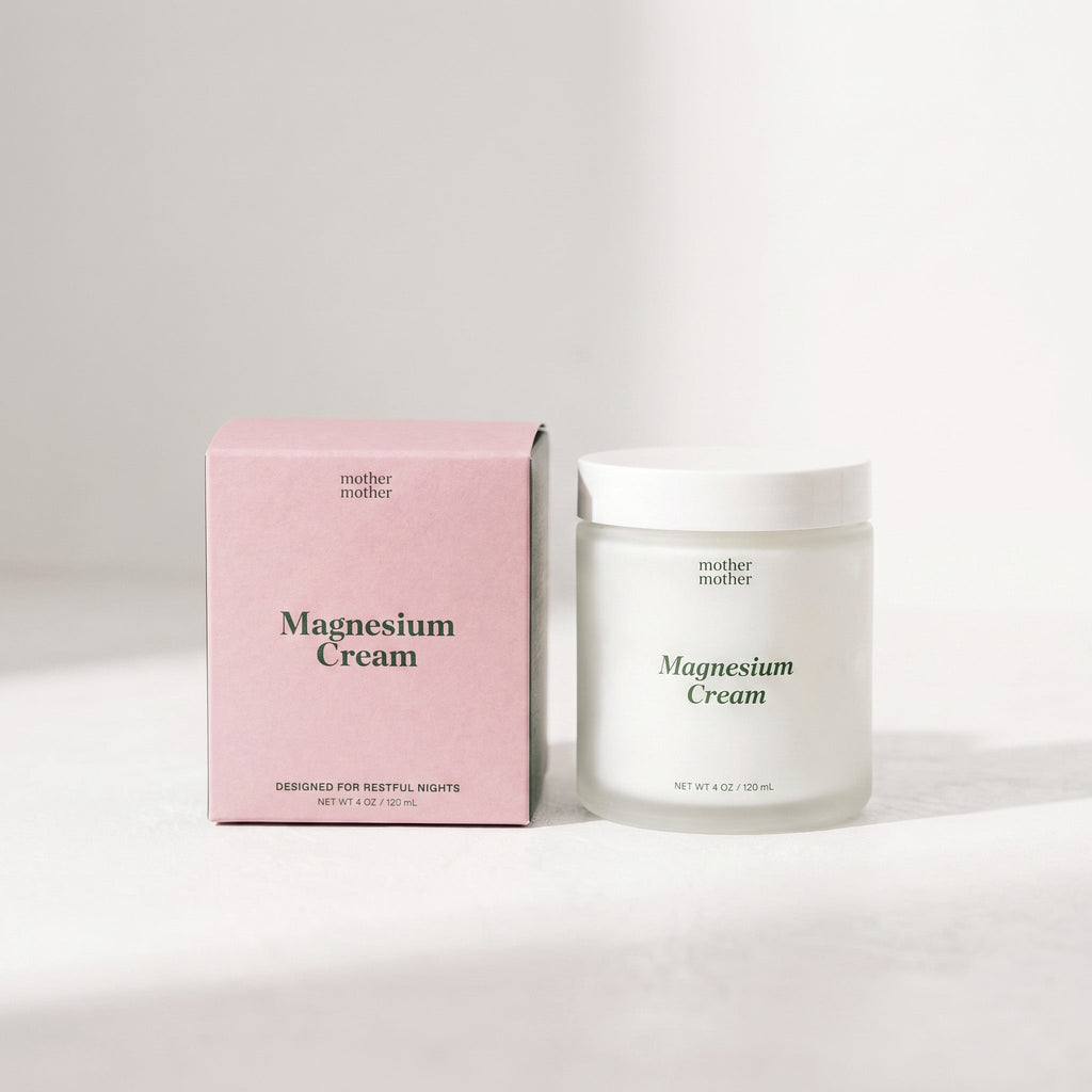 Jar of magnesium cream and pink packaging on a white background