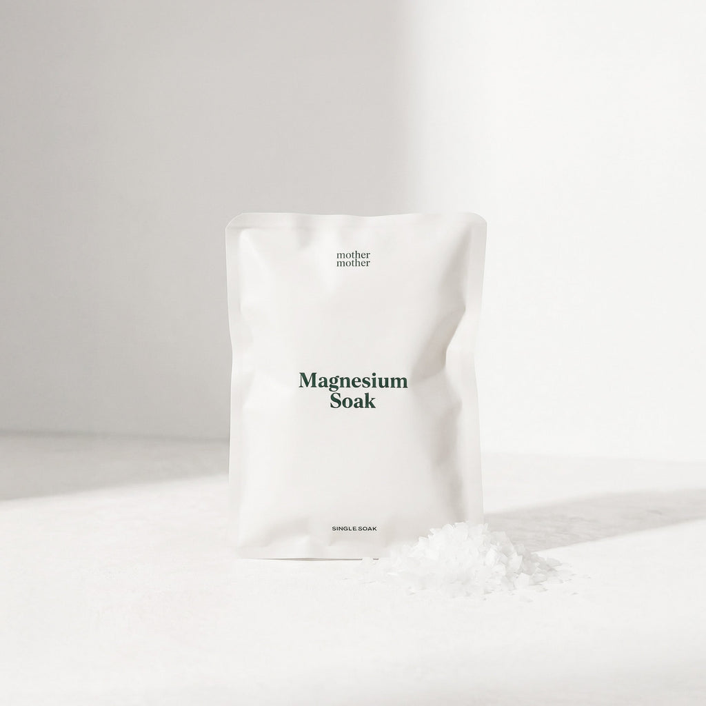 White bag labeled 'mother mother' with 'Magnesium Soak' on a white background
