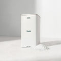 White container labeled 'Soak' by 'mother' on a light gray background